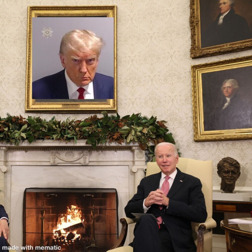 Joe Biden sitting by a fireplace with Donald Trump's mugshot framed over it.