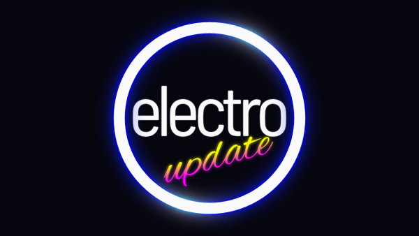 Dark background. In the centre of the picture is a large, neon blue ring. The word "electro" is displayed prominently inside the ring in lowercase, and is coloured off-white. Underneath "electro" is the word "update", which is angled, and glowing in 80s-style neon colours (vertically, yellow-to-purple)