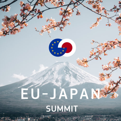 ‘EU-Japan Summit’ appears at the bottom of the photo of Mount Fuji. At the top of the mountain are the intersecting EU and Japan flags. Cherry blossoms appear around the edge of the photo. 