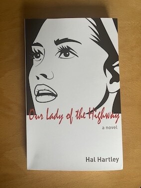 Our Lady of the Highway by Hal Hartley. Cover shows a black and white drawing of a nun, in a Pop Art style.