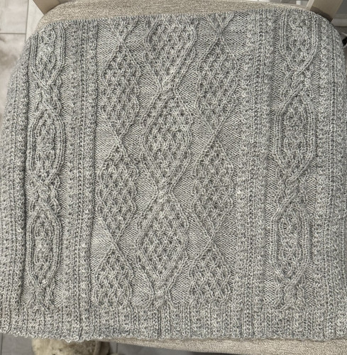 Grey knitted wrap in progress