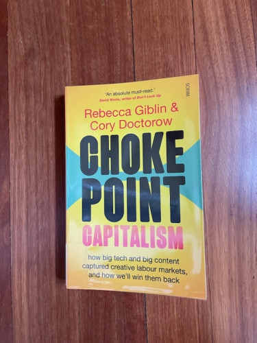 The book cover for Choke Point Capitalism (bright yellow, a splash of aqua and pink).