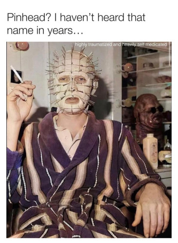 Picture of Doug Bradley getting Hell Priest makeup put on with a cigarette in one hand and the text "Pinhead? I haven't heard that name in years..."