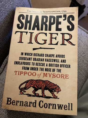 Front cover for Sharpe’s Tiger featuring a tiger and a rifle.
