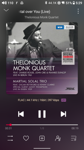 Screenshot of audio player showing album cover with black and white picture of Monk behind a piano.
