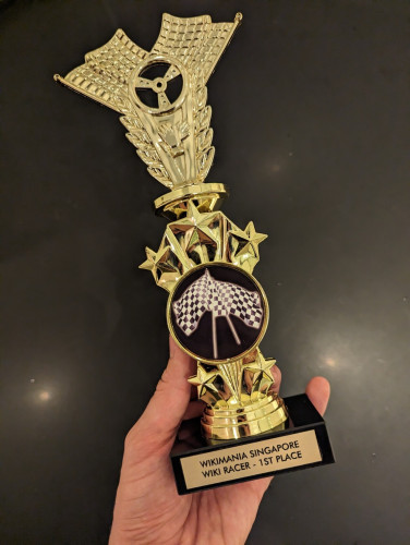 A trophy labeled "Wikimania Singapore Wiki Racer - 1st place"
