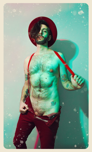 flux shirtless, wearing a red fedora hat, red suspenders and red pants. He's unzipped his pants and the base of his cock is showing.