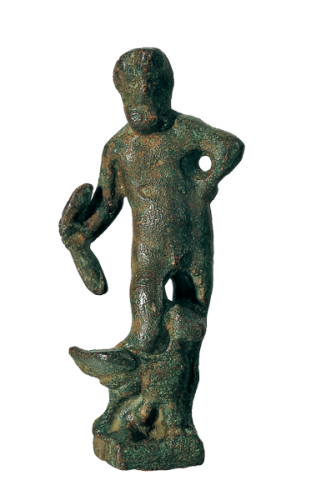 A bronze statuette representing the Roman god Jupiter. he has a bearded face and short hair, and wears a crown with a central rosette. He seems to be holding a sheaf of lightning bolts in his right hand. The iconography eschews the habitual and shows the right leg bent over an eagle at his feet with its wings outspread.