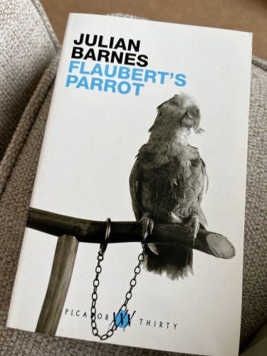 Front cover of Flaubert’s Parrot by Julian Barnes featuring unsurprisingly a parrot in all gray.