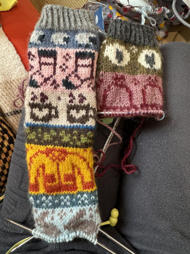 Colorwork socks. Left sock leg and instep completed. Right sock leg in progress.
