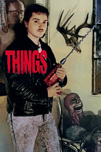 Poster art for Things.

A man is holding a drill with a very long bit. Behind him there are antlers on the wall and also maybe a mummified corpse?