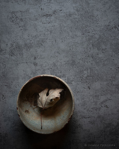 Photography of autumn single leaf in a rustic bowl found at a flea market.