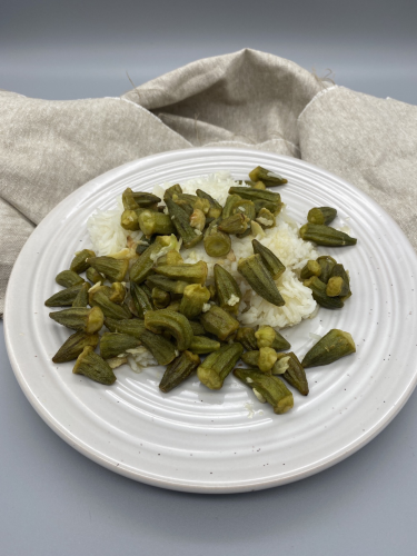 Baby okra served over white rice 