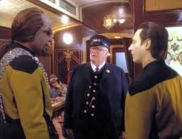 Worf and Data on a holodeck train speaking to a hologram train conductor 