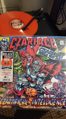 Czarface Czartificial Intelligence Stole The Ball Edition comic style of a metal masked villain stealing a ball and running away. Hype sticker on the, details on the left on a outer cover 