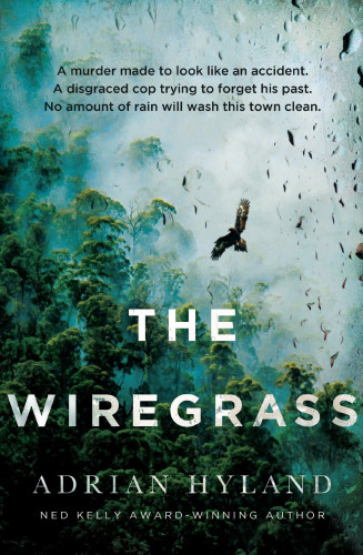 Image of the book cover for The Wiregrass by Adrian Hyland with the subtitle "A murder made to look like an accident. A disgraced cop trying to forget his past. No amount of rain will wash this town clean." 

The image is of looking down towards a view of a Victorian rainforest, with the green tall trees (possibly Mountain Ash) at the bottom left, fading into heavy foggy rain towards the top right. There's a Wedgetail Eagle in full flight side on towards the viewer showing the white markings on the underside of its wings and tail. There's a hint of raindrops on the "lens" looking into the image. 