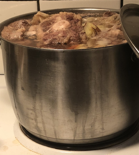 Huge pot of boiling meat