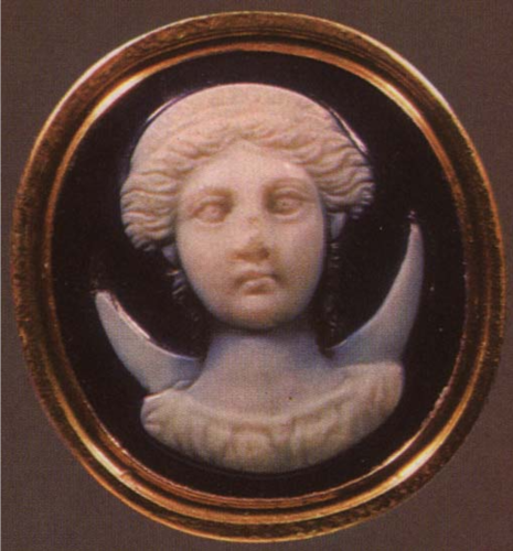 Cameo of the moon goddess Selene against a black sardonyx background. The crescent moon appears behind her shoulders.