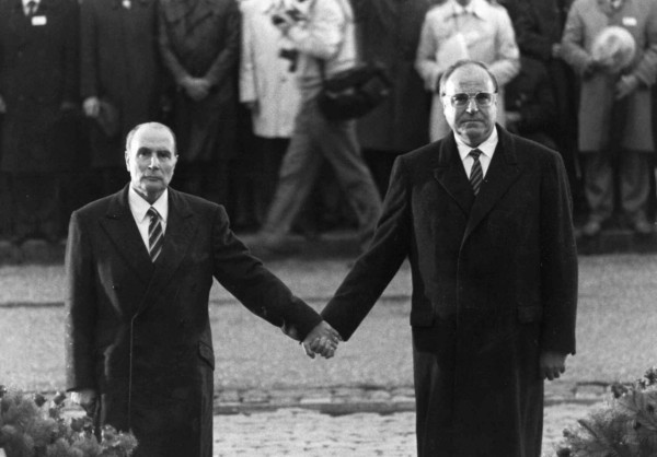 A photo of the handshake of French President François Mitterrand and German Federal Chancellor Helmut Kohl on 22 September 1984 at the entrance of the Douaumont ossuary, Verdun, France. 