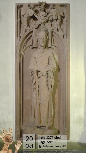 The picture shows a grave slab embedded in a wall. Semi-sculptural on it is a figure of the bishop in his regalia