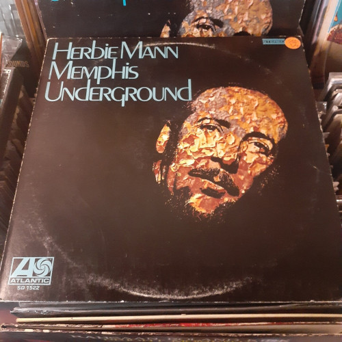 Album cover features an artistic rendering of HM's face.