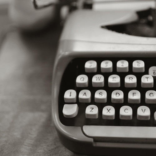 a typewriter on a desk