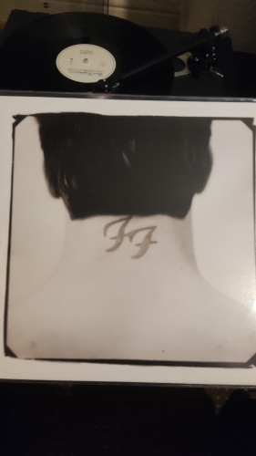 Tattoo on the back the neck of FF vinyl cover 
