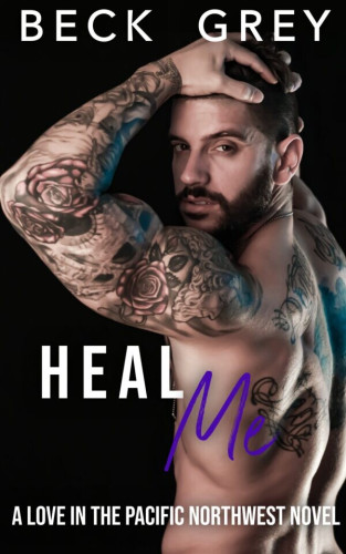 Cover - Heal Me by Beck Grey - Handsome shirtless muscular tattooed white man with fark hair and short beard and moustache, hand on his head, looking back at the viewer over his shoulder. Black background.