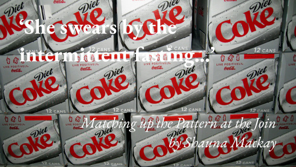 Boxes of Diet Coke, with a quote from Shauna Mackay's short story Matching up the Pattern at the Join: 'She swears by the intermittent fasting…'