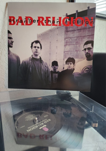 Bad Religion - Stranger Than Fiction album cover. The band members in a black and white photo.  Vinyl is black.