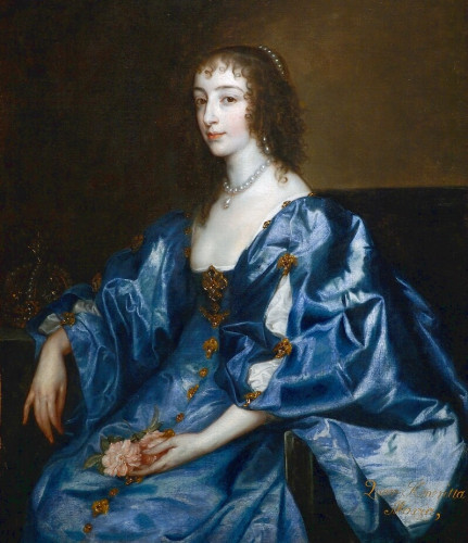A painted portrait of Henriette Marie of France, Queen of England. She sits alone, looking directly at the viewer. She wears a blue silk, shiny gown. Her brown hair is curly and down about her shoulders. She has an abundance of pearls. 
In the shaded background sits her crown. 