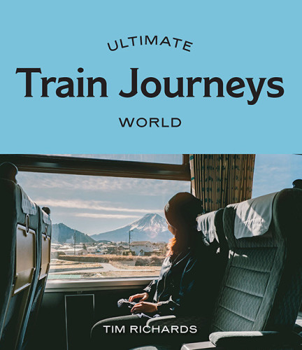 Cover of Ultimate Train Journeys: World, featuring a woman sitting in a seat aboard a train, looking out at a mountainous landscape.