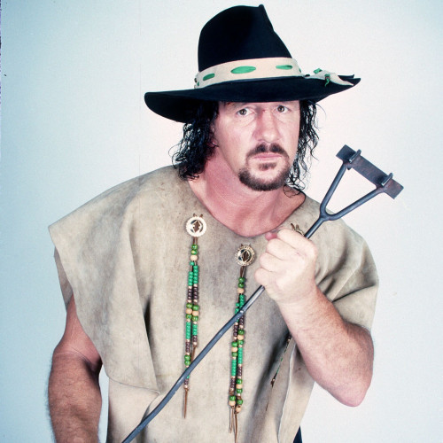 Wrestling legend Terry Funk from the late 1980s with his branding iron