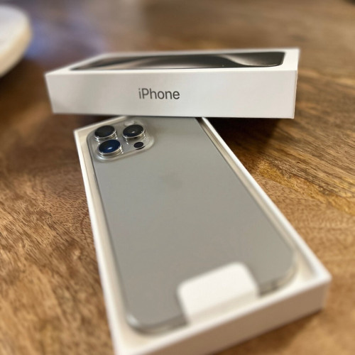 iPhone 15 pro max in natural titanium color
