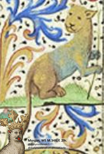 Picture from a medieval manuscript: A cat looking bored